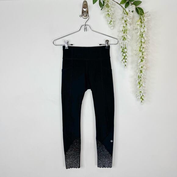 lululemon athletica Pants - LULULEMON Tight Stuff Tight Scalloped Hem leggings polka dot trim 2943
